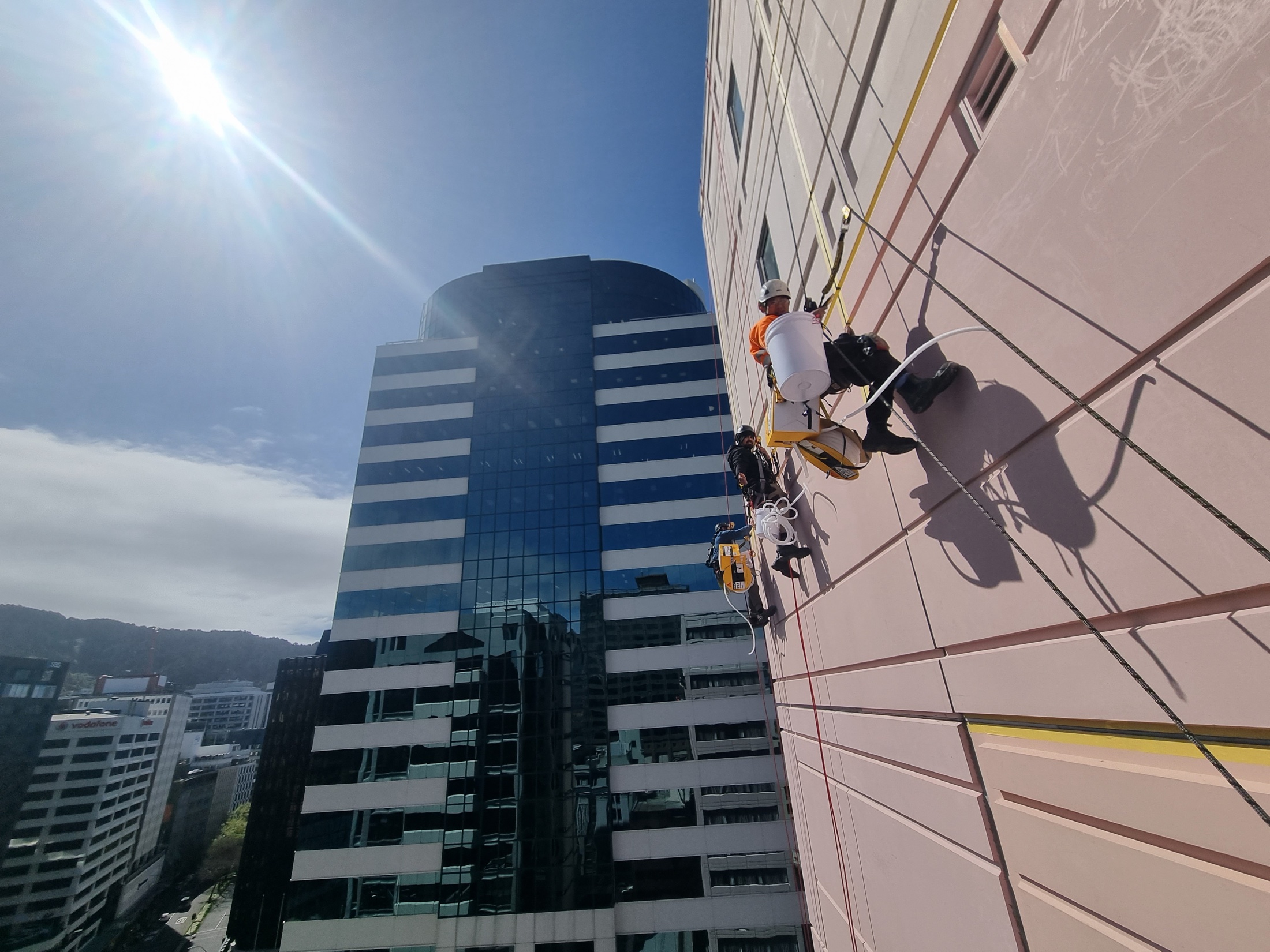 Two Highrise rope access technicians on a Wellington tower