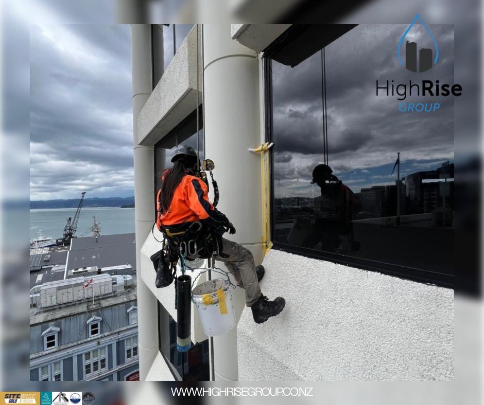 Rope access abseiling a Wellington glass tower